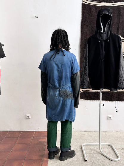 A work shirt with chaotic repairs