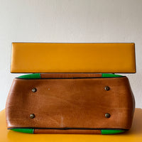 Vintage green and camel leather bag
