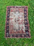 great faded hand woven antique rug