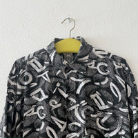 90s abstract patterned shirt