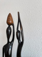 Vintage men and women wooden sculpture , mid century