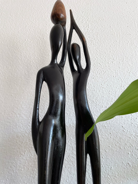 Vintage men and women wooden sculpture , mid century