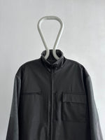 Unknown rubber and fleece jkt.