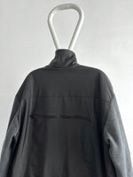 Unknown rubber and fleece jkt.