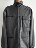 Unknown rubber and fleece jkt.