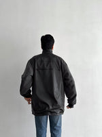 Unknown rubber and fleece jkt.