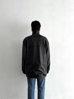 Unknown rubber and fleece jkt.