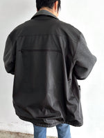 Unknown rubber and fleece jkt.