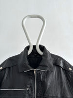 1980s Italy leather black.