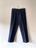 Italy two tuck denim slacks.