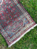 vintage runner rug with flower patterned