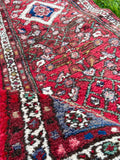 vintage runner rug with flower patterned