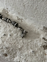 sterling silver tassel link with burn up heart charm