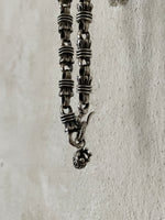 sterling silver tassel link with burn up heart charm