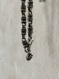 sterling silver tassel link with burn up heart charm