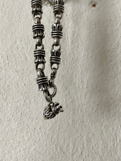 sterling silver tassel link with burn up heart charm