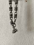 sterling silver tassel link with burn up heart charm