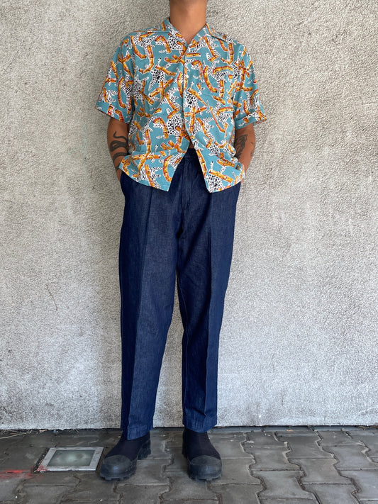 Italy two tuck denim slacks.