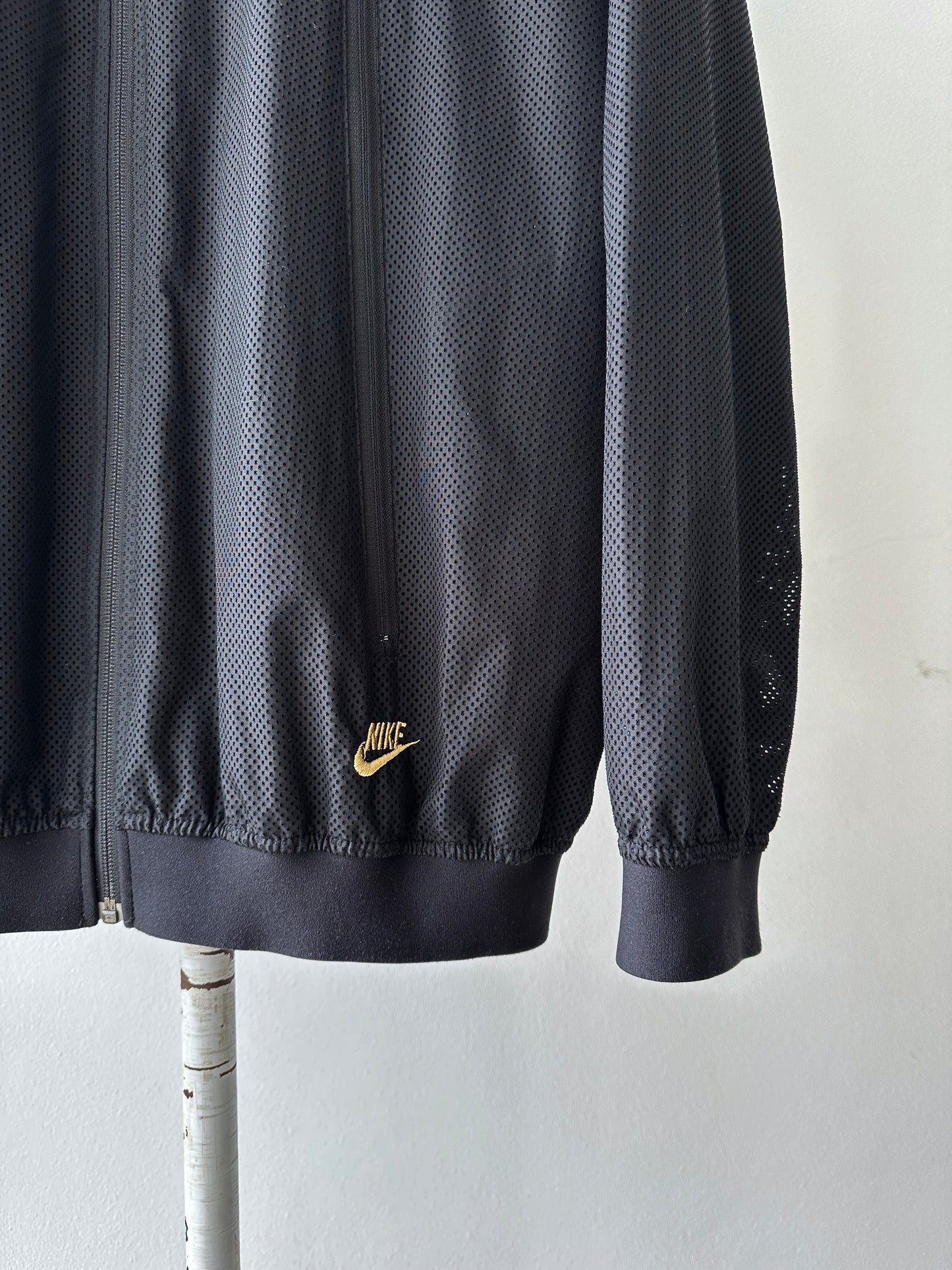 Early 2000s Nike mesh jacket.