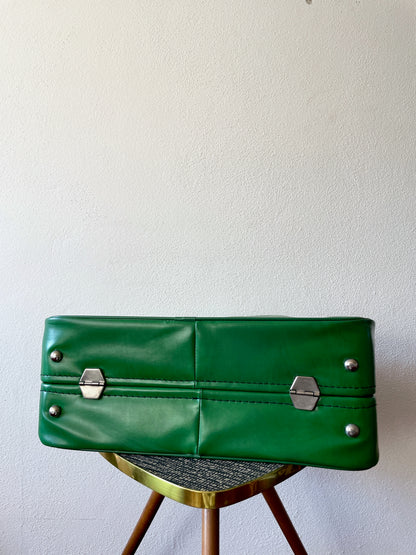 green leather travel bag