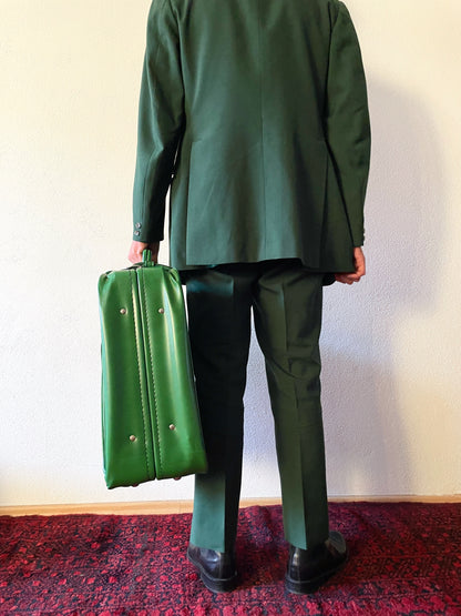 green leather travel bag