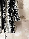 abstract monotone modacryl fur coat