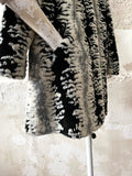 abstract monotone modacryl fur coat