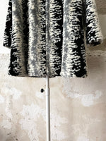 abstract monotone modacryl fur coat